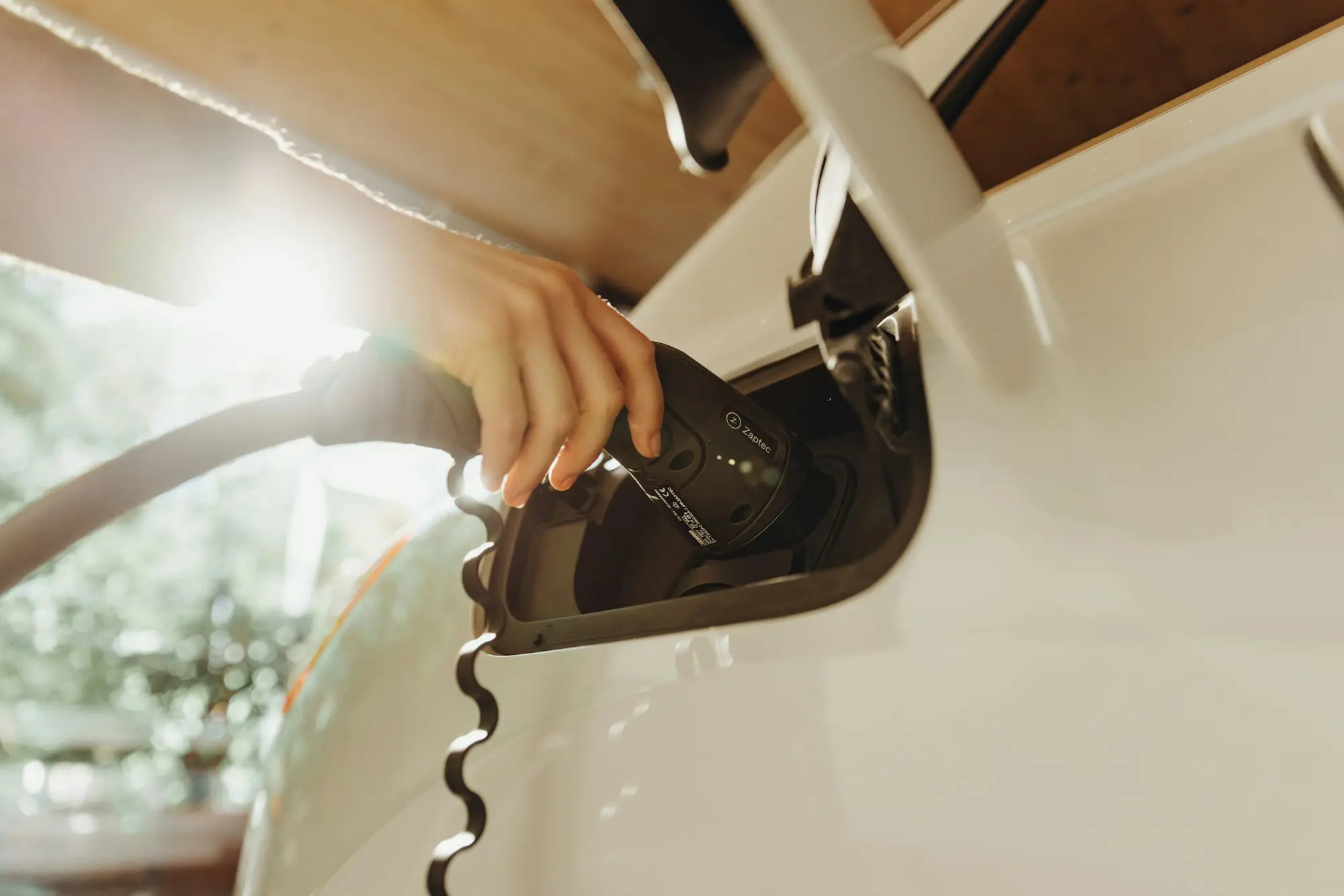 Electric van charging at a workplace depot charger in Australia